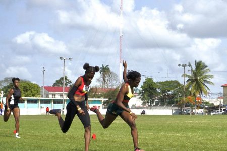 Golden Run! Tianna Springer (left) won the individual 150m women’s event in an exciting photo finish with Keliza Smith then went on to anchor her 4x100m, 4x200m and 4x400m relay teams to victory.