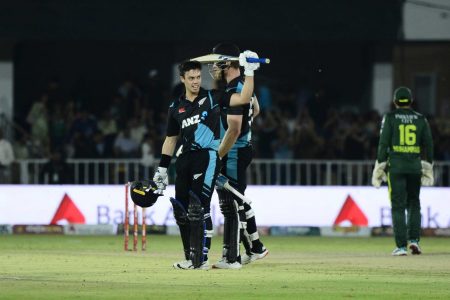 Mark Chapman celebrates reaching his century.
