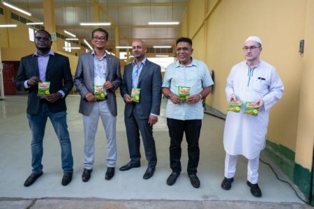 Minister of Agriculture, Zulfikar Mustapha (second from right), former Chairman of the Private Sector Commission, Paul Cheong (second from left) and Chief Executive Officer of Caribe Snackz, Chief Samsair (centre) at the launch of Caribe Snackz. (DPI photo)