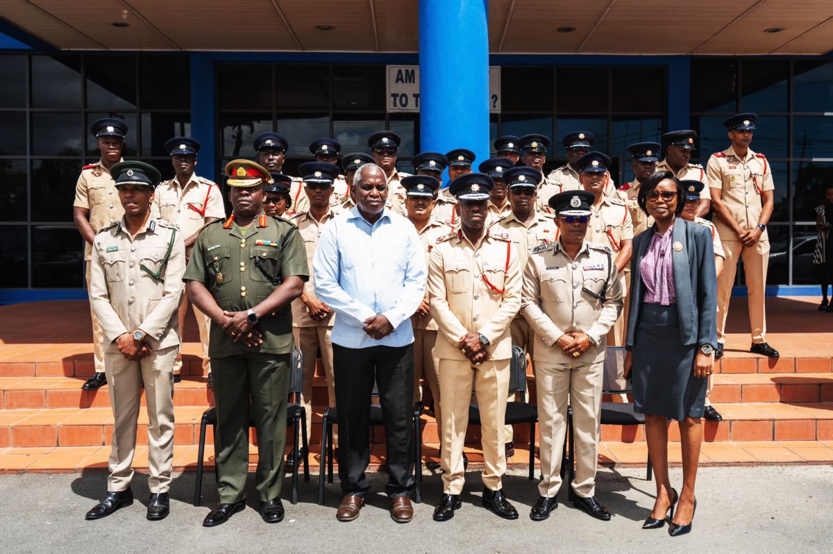 Officers and invitees posed for a photo (Ministry of Home Affairs photo)