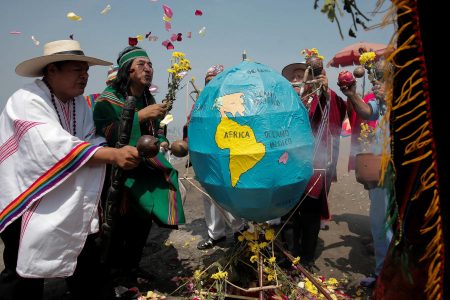 Peru’s shamans perform a traditional ritual and make an offer to ‘Pachamama (Mother Earth)’ on the eve of Earth Day, in Lima, Peru April 21, 2023. 