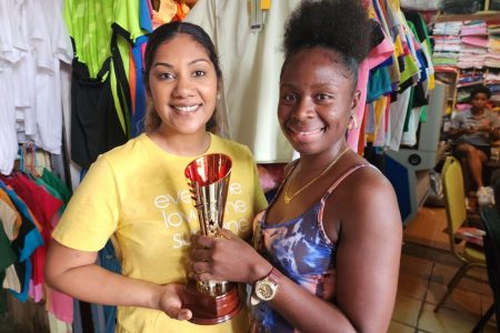 In the photo above, Emma Sunich Hussain, daughter of Trophy Stall’s CEO, Ramesh Sunich, hands over the Champion Jockey trophy to a representative of the Port Mourant Turf Club.
