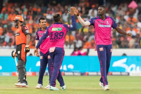 West Indies teammates Shimron Hetmyer (left) and Jason Holder
celebrate a wicket during yesterday’s game. (Photo courtesy IPL)
