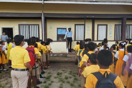 Police Constable Grant who is stationed at the Mahdia Police Station yesterday delivered  a Road Safety and Traffic Lecture to the pupils at Mahdia Primary School in Region Eight. (Guyana Police Force photo)