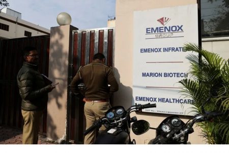 Police is seen at the gate of an office of Marion Biotech, a healthcare and pharmaceutical company and a part of the Emenox Group, whose cough syrup has been linked to the deaths of children in Uzbekistan, in Noida
