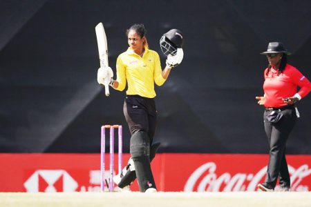 West Indies Women’s captain Hayley Matthews (left) celebrates reaching her hundred in the final of the FairBreak Invitational watched by West Indian female umpire Jacqueline Williams. (FairBreak Global photo)
