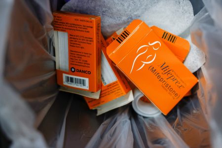 Used boxes of Mifepristone, the first pill in a medical abortion, line a trash can at Alamo Women's Clinic in Carbondale, Illinois, U.S., April 20, 2023. REUTERS/Evelyn Hockstein