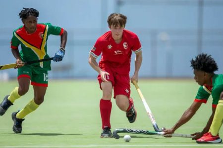 Part of the action between Guyana and the United States of America in their opening match of the Junior Pan American Hockey championships. Photo courtesy of the PAHF.