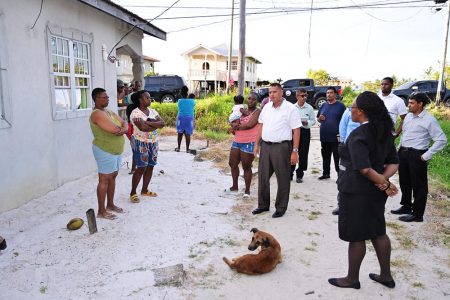 Minister of Housing and Water, Collin Croal (centre) meeting with the residents (CHPA photo)