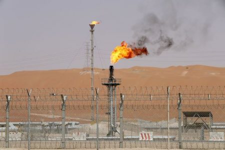 Flames are seen at the production facility of Saudi Aramco's Shaybah oilfield in the Empty Quarter, Saudi Arabia May 22, 2018. Picture taken May 22, 2018. REUTERS/Ahmed Jadallah/