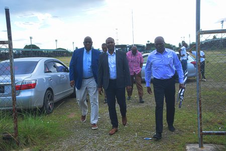 Project Director for CONCACAF, Howard McIntosh entering the site that will eventually be the home for Guyana’s first football stadium alongside members of the GFF inclusive of President Wayne Forde 