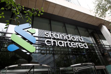 FILE PHOTO: The Standard Chartered bank logo is seen at its headquarters in London, Britain, July 26, 2022.  REUTERS/Peter Nicholls