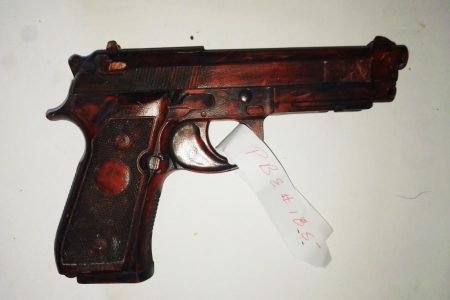 The toy gun used to rob the money changer