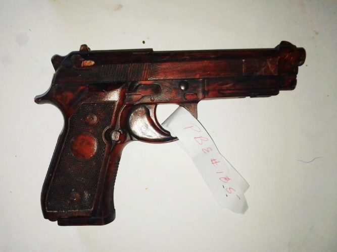 The toy gun used to rob the money changer