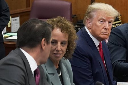 Former President Donald Trump sits at the defense table with his legal team in a Manhattan court, Tuesday, April 4, 2023, in New York. Trump is appearing in court on charges related to falsifying business records in a hush money investigation, the first president ever to be charged with a crime. (AP Photo/Seth Wenig, Pool)