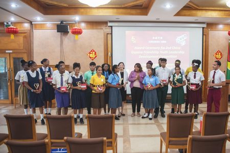 The winners with Chinese Ambassador to Guyana, Guo Haiyan and Minister of Education Priya Manickchand (Ministry of Education photo)