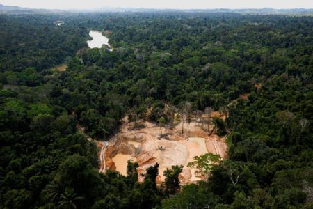 A helicopter of the Brazilian Environmental Agency (IBAMA) is seen near Uraricoera river during an operation at illegal mining in the Yanomami indigenous land, Roraima state, Brazil, February 11, 2023. REUTERS/Amanda Perobelli/File Photo
