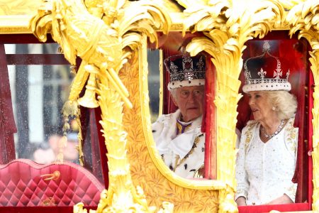 Britain's King Charles and Queen Camilla travel from Westminster Abbey in the Gold State Coach, following their coronation ceremony, in London, Britain May 6, 2023. REUTERS/Lisi Niesner