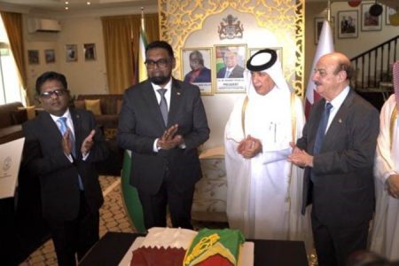 President Irfaan Ali (second from left), Senior Finance Minister, Dr Ashni Singh (left), and Qatari officials at the opening of the Guyana Embassy in Qatar on Tuesday (Doha News photo)