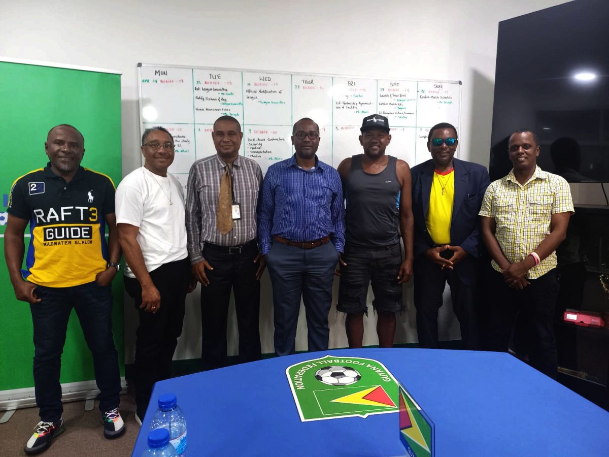 From left, Eon Williams, Lawrence Arjoon, Charwayne Walker, Roger Joseph, Deon Barnwell
and Junior Forrester at a meeting with GFF president Wayne Forde, fourth from left, last Thursday.