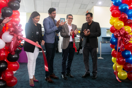 Álvaro Enrique Sánchez Cordero, Ambassador Extraordinary and Plenipotentiary, the Bolivarian Republic of Venezuela (second in photo from right) applauds after cutting the ribbon to officially mark the resumption of Caribbean Airlines’ operations to Caracas, during a brief ceremony held at the Piarco International Airport on Saturday May 13th.  He is flanked by Caribbean Airlines Vice President, Maintenance & Engineering, Varma Khillawan (first from right) and Alicia Cabrera, Caribbean Airlines’ Executive Manager Marketing & Loyalty (first from left in photo).