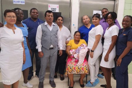 Anette Da Silva with her baby and staff (Ministry of Health photo)