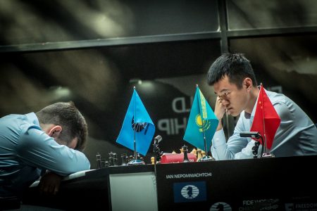 Ding Liren (right) and Ian Nepomniachtchi (Photo: FIDE/Anna Shtourman)