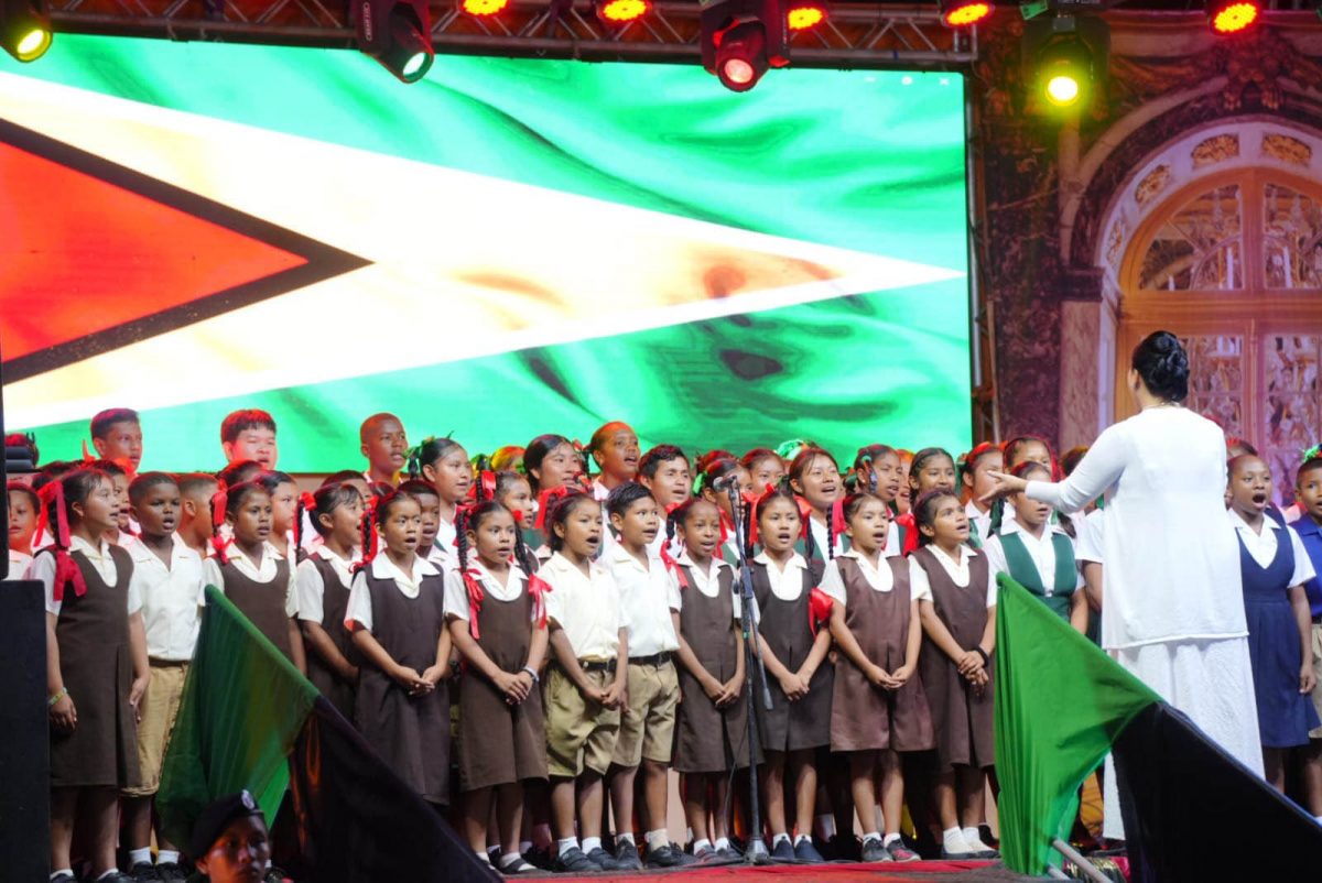 A children’s choir taking part in Thursday’s Independence Anniversary observance in Lethem. The event which was held at the Tabatinga Sports Complex was markedly different from previous years because of  Sunday’s deaths of 19 children in a fire at Mahdia. (Office of the President photo)
