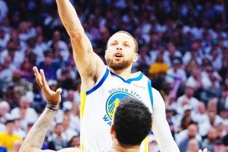 Stephen Curry rose above the Sacramento Kings players Sunday night dropping a record 50 points on the road to help the defending champs reach the Western Conference semi-finals.