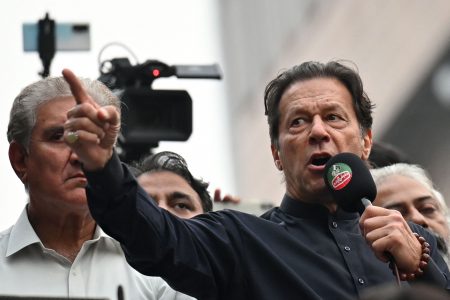 Pakistan’s former prime minister Imran Khan (R) addresses his supporters during an anti-government march towards capital Islamabad, demanding early elections, in Gujranwala on November 1, 2022.Arif Ali | AFP | Getty Images