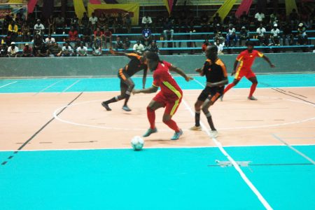 Part of the action between Bent Street (red) and Albouystown in the ‘One Guyana’ National Futsal Championship
