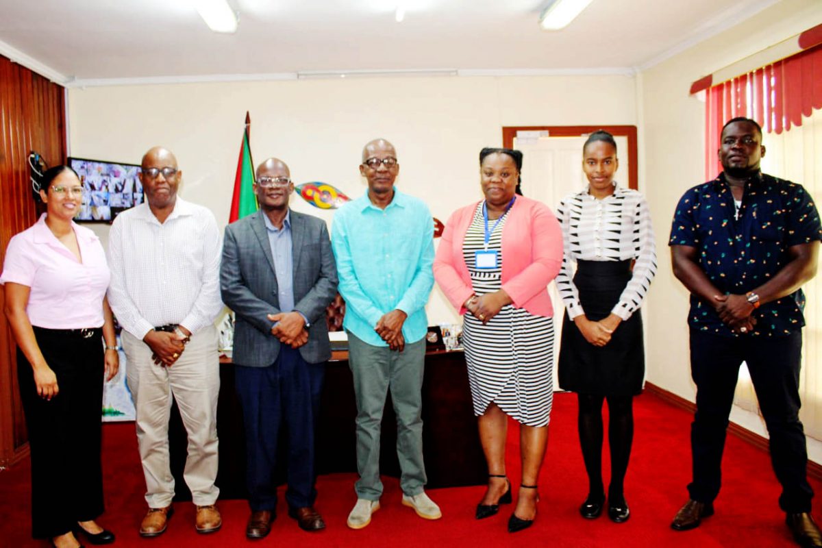 Minister of Labour, Joseph Hamilton  (fourth from right) at the meeting (Ministry of Labour photo)