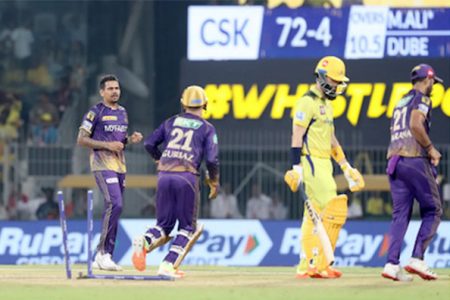 KKR off-spinner Sunil Narine (left) reacts after he bowled Chennai Super Kings batsman Moeen Ali during their Indian Premier League T20 match yesterday in Chennai. (IPLT20 photo)
