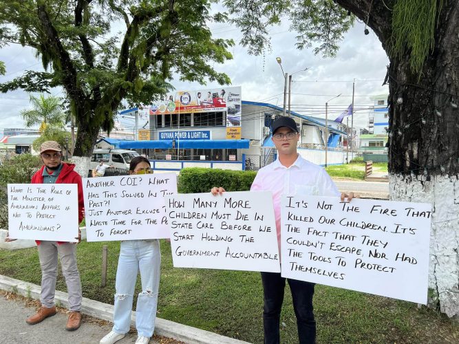 The protest yesterday in front of State House, Main Street, Georgetown.