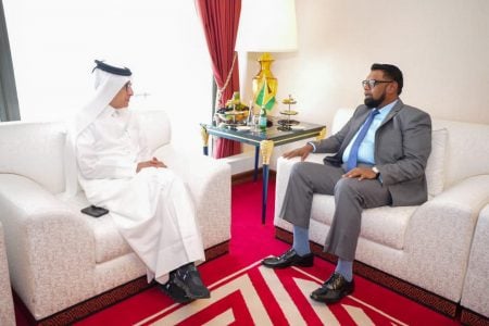 President Irfaan Ali (right) with Chairman of Qatar Tourism and Group CEO of Qatar Airways Akbar Al Baker (Office of the President photo)