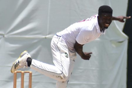 Team Weekes off-spinner Kevin Sinclair sends down another delivery during his destructive spell against Team Headley in the Headley-Weekes Tri-Series yesterday at the Coolidge Cricket Ground in Antigua. (CWI Media photo)