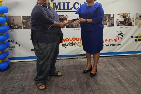 NAMILCO’s Marketing Supervisor, Alicia Anderson presented a sponsorship cheque to the union’s Treasurer, Troy Yhip Monday