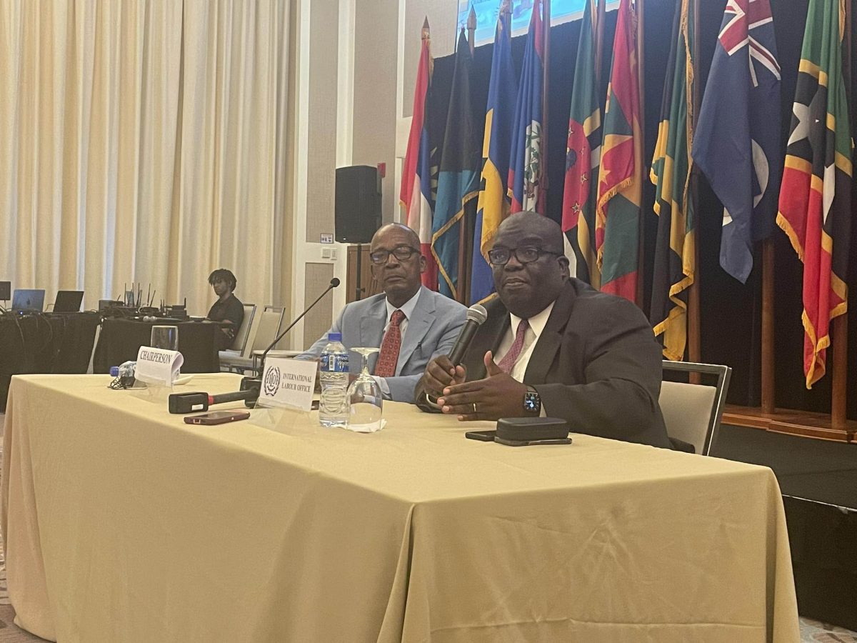 Minister of Labour Joseph Hamilton (left) and ILO Caribbean Director Dennis Zulu at the press conference yesterday 