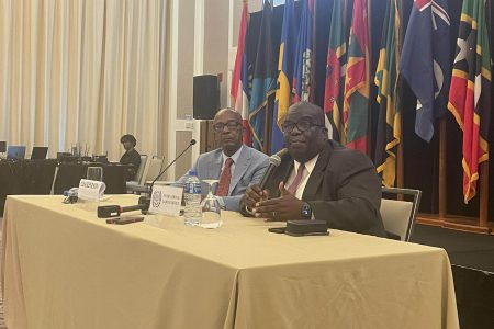 Minister of Labour Joseph Hamilton (left) and ILO Caribbean Director Dennis Zulu at the press conference yesterday 