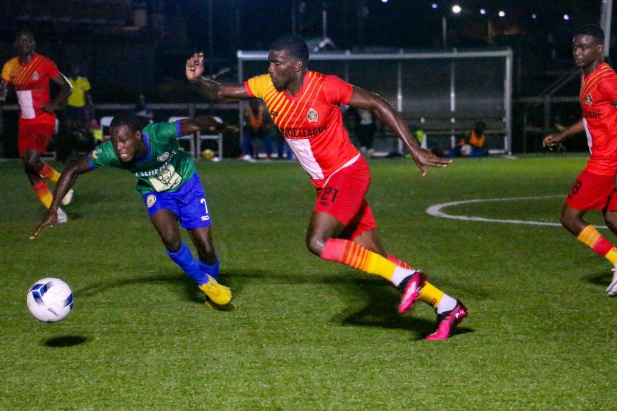 Colin Nelson (centre) of GDF initiating a counterattack against Victoria Kings in the KFC Elite League