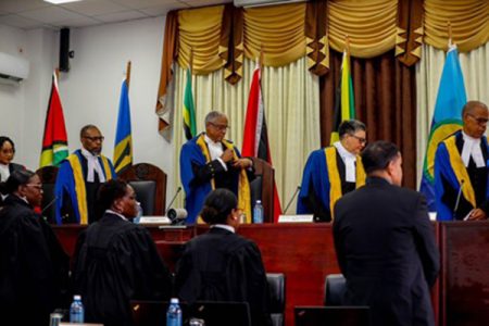 Judges of the Caribbean Court of Justice leaving the Bench  following the opening ceremony of the itinerant sittings (DPI photo)