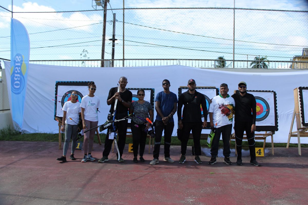 The respective top five finishers in each of the four sections pose with their spoils following the culmination of the Archery Guyana’s Independence Open Tournament