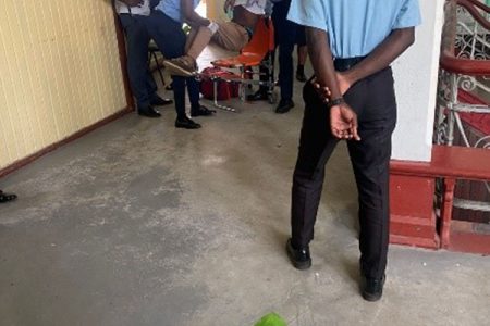 Wesley Bazil being placed onto a stretcher by the EMTs after collapsing upon learning that he had been found guilty for rape 