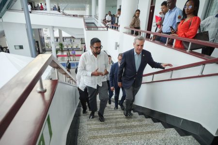 President Irfaan Ali (left) and Dominican Republic President, Luis Abinader mounting the stairs at the Arthur Chung Conference Centre (Office of the President photo)