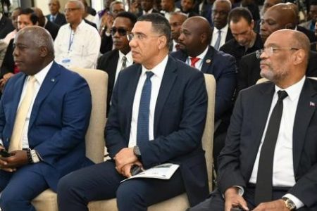Host Prime Minister Andrew Holness seated between his Bahamian counterpart Philip Davis (left) and Ariel Henry of Haiti at the opening of a three-day meeting for Haitian stakeholders at the Liberty Hall at the Ministry of Foreign Affairs and Foreign Trade in downtown Kingston on June 11, 2023. -Rudolph Brown photo