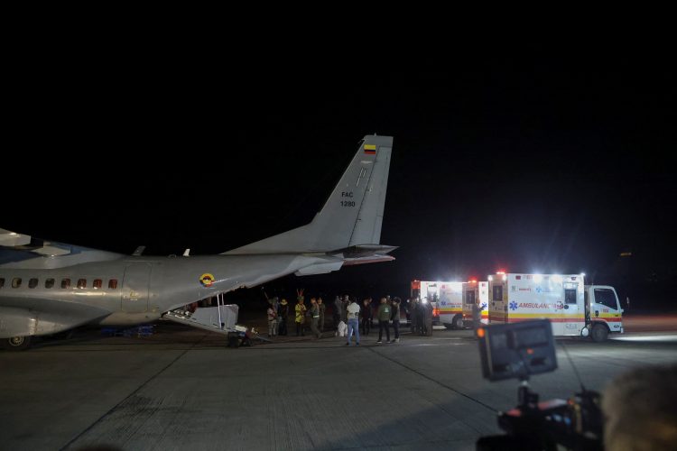 A view of ambulances and a plane from San Jose del Guaviare bringing in child survivors from a Cessna 206 plane that crashed in thick jungle, at the CATAM military airbase, in Bogota, Colombia, June 10, 2023. REUTERS/Luisa Gonzalez