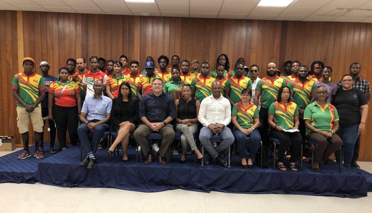 The GOA Executive Committee posing with several of the athletes and coaches that will be representing Guyana at the CAC Games in El Salvador and the Dominican Republic