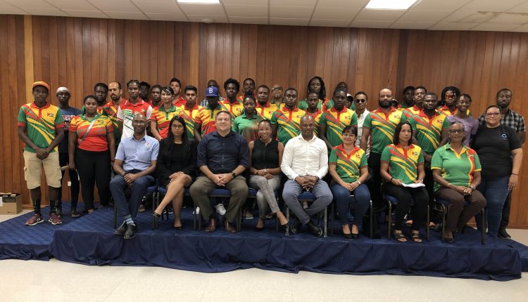 The GOA Executive Committee posing with several of the athletes and coaches that will be representing Guyana at the CAC Games in El Salvador and the Dominican Republic