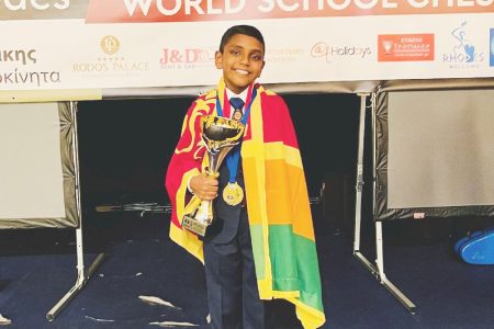 Thehas Rithmitha Kiringoda, gold medallist in the 2023
Under-9 World Schools Chess Championship, smiling and holding his winning trophy while draped in the flag of Sri Lanka, the country of his birth. He was the 21st seed among 61 players from 24 countries. (Photo: Sagar Shah)