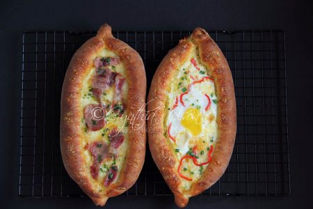 The dough for these Georgian Flatbreads has hints of
sweetness to balance the savoury filling – ham, egg, cheese
(Photo by Cynthia Nelson)